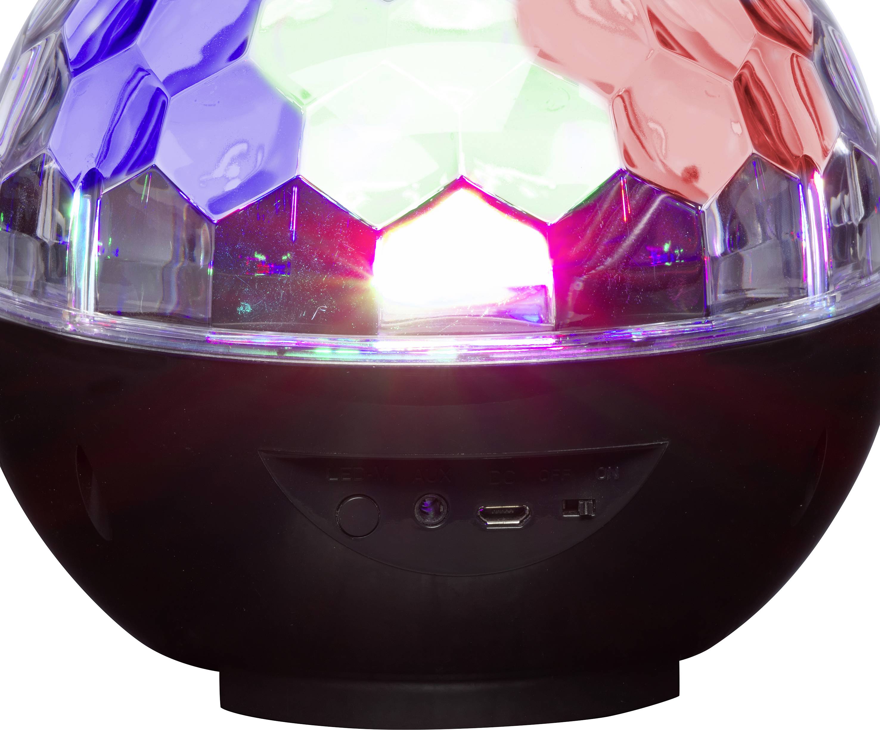 Kulista kula dyskotekowa świeci w kolorach czerwonym, niebieskim i zielonym. Stoi na czarnym postumencie i jest używana jako efekt świetlny.