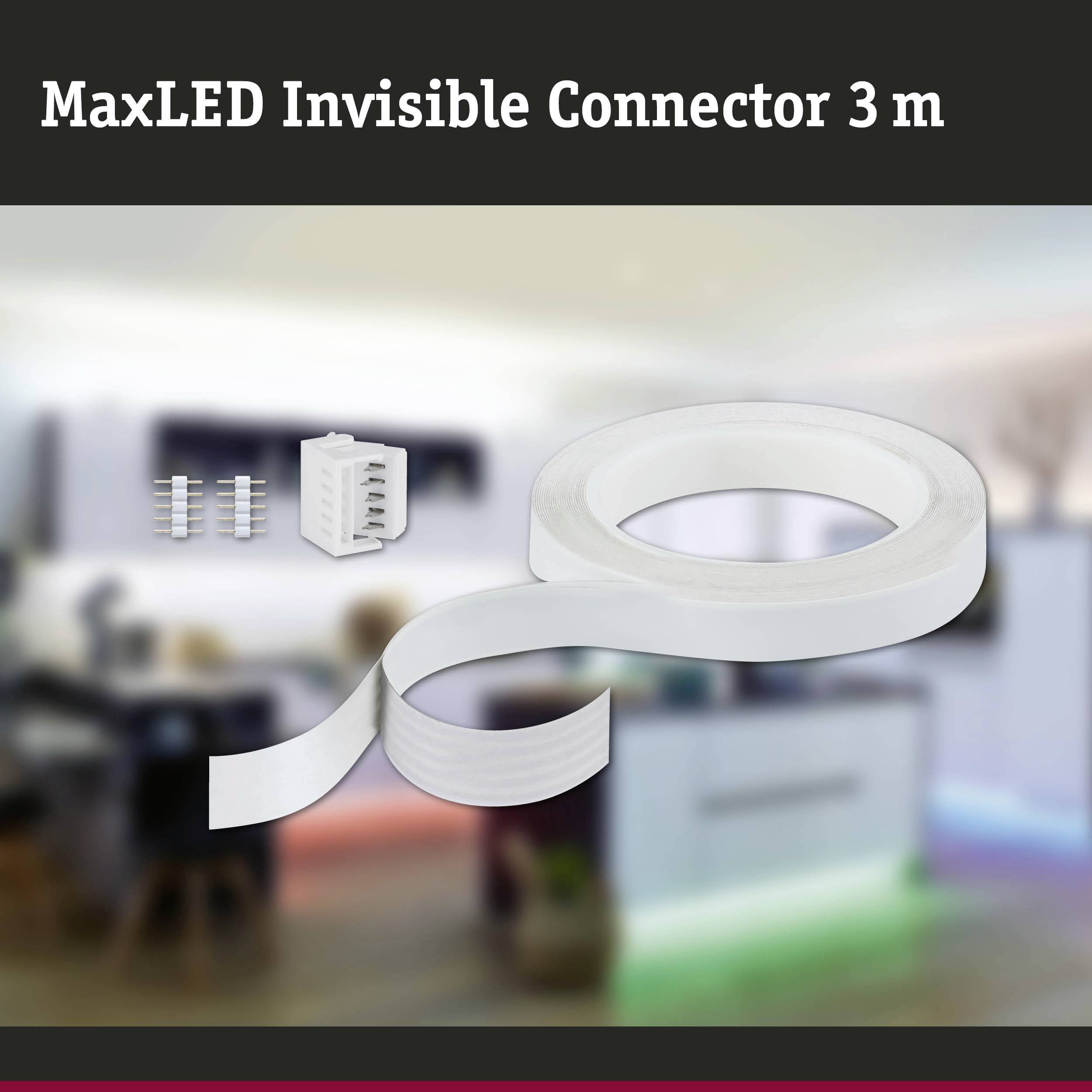Złącze MaxLED Invisible Connector 3 m. Przedstawia rolkę taśmy LED z akcesoriami, rozmazane tło nowoczesnego salonu.