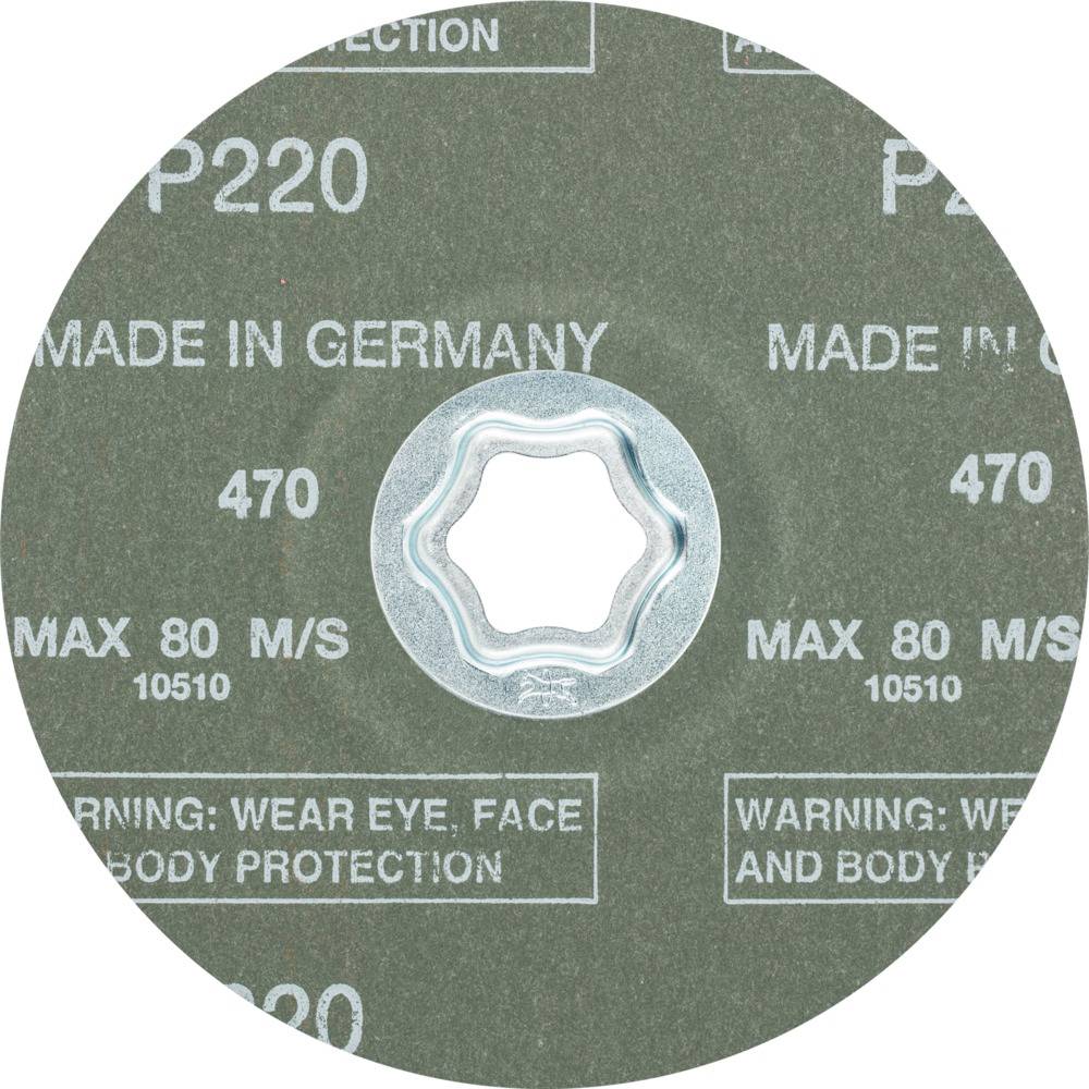 Tarcza szlifierska z napisem 'P220', 'MADE IN GERMANY', 'MAX 80 M/S', 'UWAGA: UŻYWAĆ OCHRONY OCZU, TWARZY I CIAŁA'.