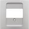 Szary kwadratowy ramka, prawdopodobnie do włącznika lub gniazdka elektrycznego, z prostokątnym wycięciem i małym otworem u dołu.