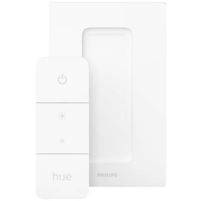 Przełącznik ściemniający Philips Hue z trzema przyciskami do regulacji natężenia światła, obok białego uchwytu ściennego.