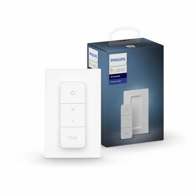Przełącznik ściemniający Philips Hue z opakowaniem. Przełącznik posiada cztery przyciski do sterowania oświetleniem. Opakowanie prezentuje zdjęcie przełącznika.