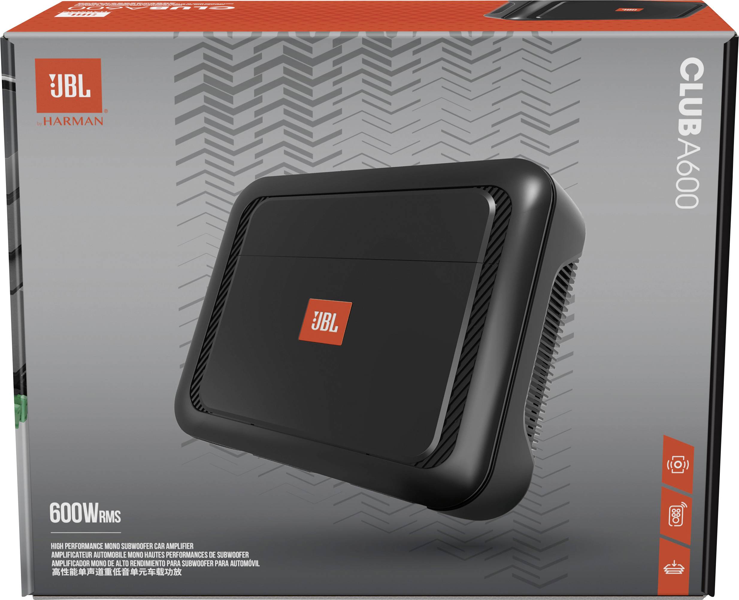 Czarna głośnica JBL z czerwonymi akcentami stoi przed szarym tłem we wzór strzałek.