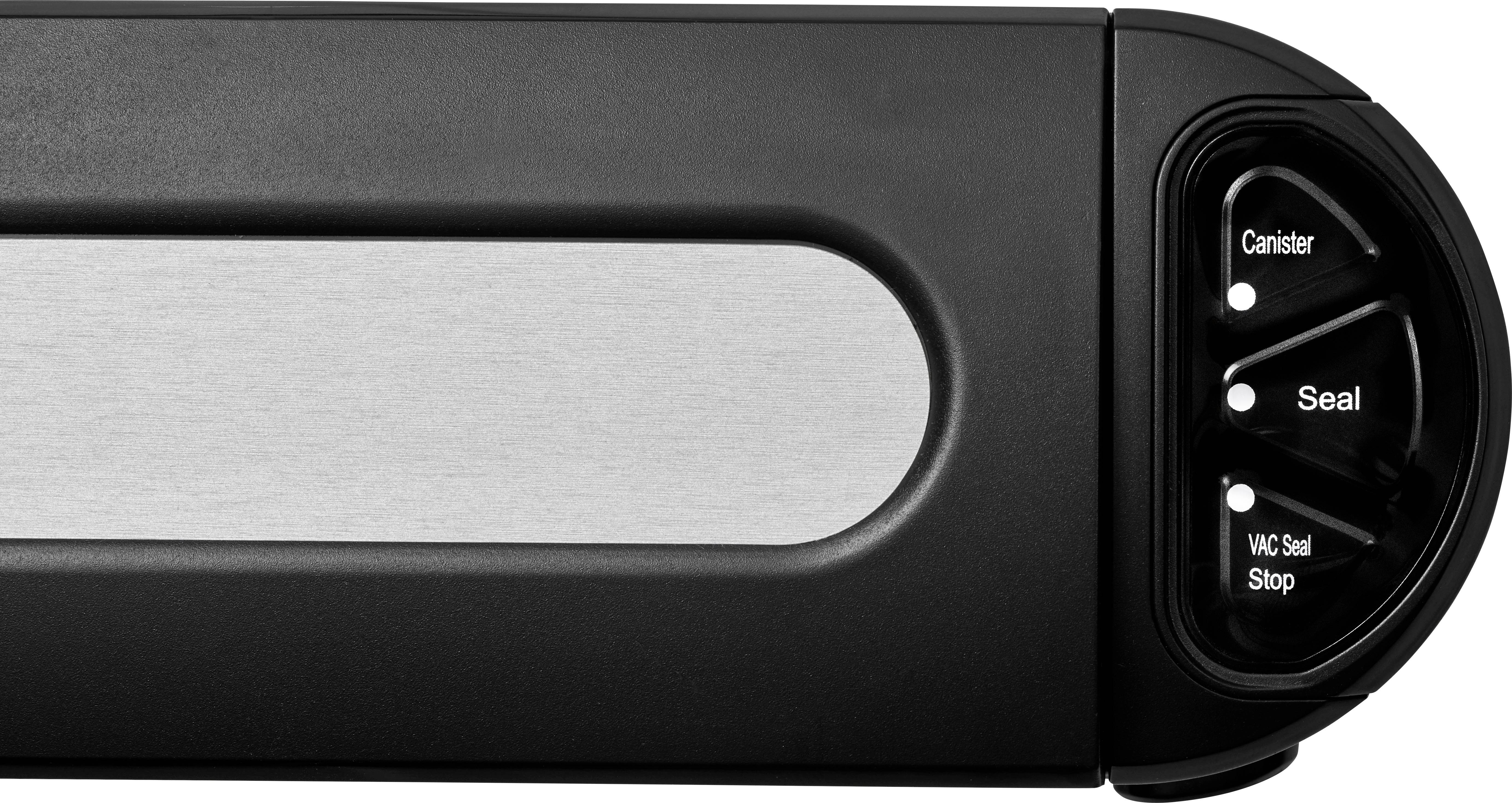 Elektroniczny panel sterujący z trzema przyciskami: Canister, Seal i Vac Seal Stop. Dolny prawy róg urządzenia.