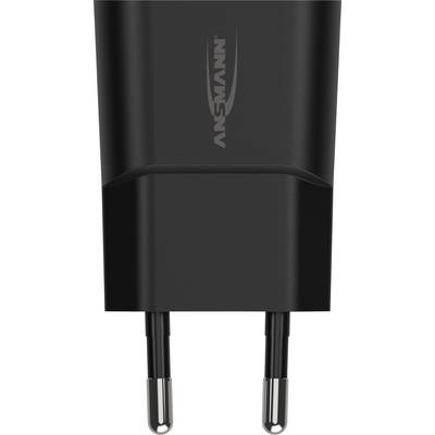 Czarna ładowarka z dwoma metalowymi bolcami do europejskich gniazd elektrycznych, z widoczną marką Ansmann na przedniej stronie.