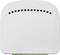 Biały sprzęt elektroniczny z otworami wentylacyjnymi na górze, prawdopodobnie router lub modem wykonany z tworzywa sztucznego.
