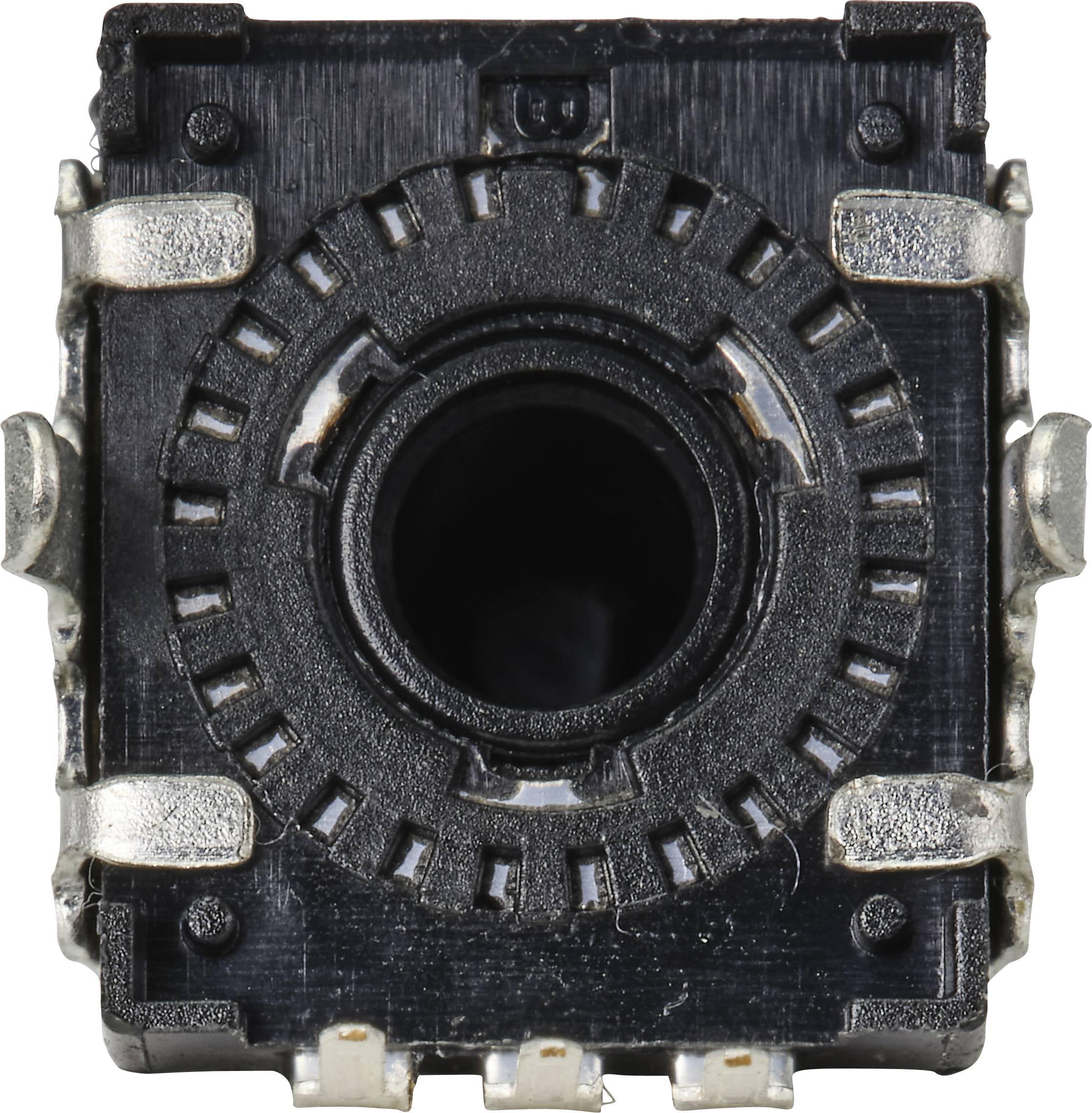 Czarno-srebrny, cylindryczny element, prawdopodobnie część urządzenia elektronicznego lub mechanicznego, sfotografowany z bliska.