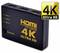 Przełącznik HDMI z trzema wejściami i jednym wyjściem, obsługujący 4K Ultra HD. Wskaźniki LED sygnalizują aktywne wejście.