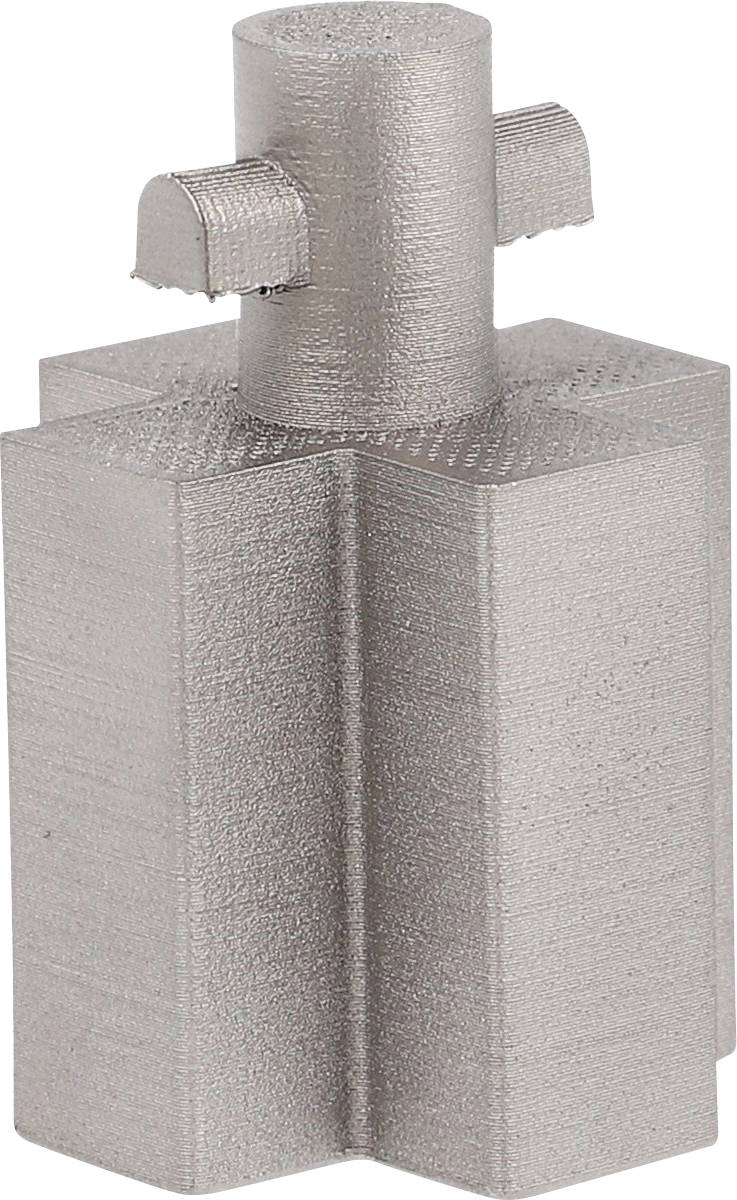 Metalowy element wydrukowany w technologii 3D z cylindryczną górną powierzchnią i dolną sekcją w kształcie krzyża, prezentujący precyzyjne wykonanie.