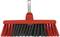 Czerwona miotła z czarnymi i czerwonymi włoskami. Miotła posiada metalowy uchwyt bez trzonka.