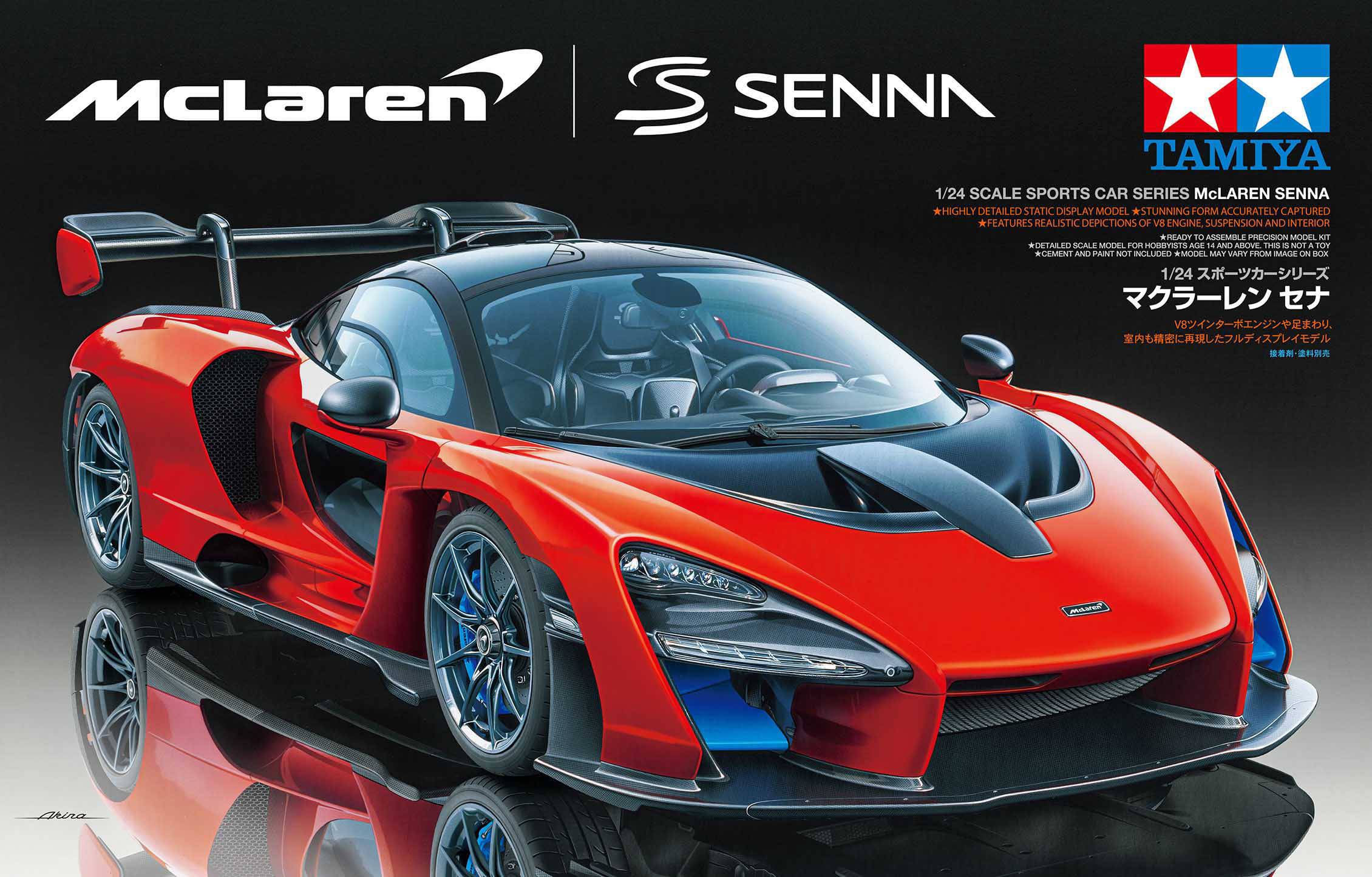 Model samochodu McLaren Senna, w kolorach czerwono-czarnych, widziany z boku. Powyżej logo McLarena, Senny i Tamiya. Obecne są azjatyckie znaki pisma.