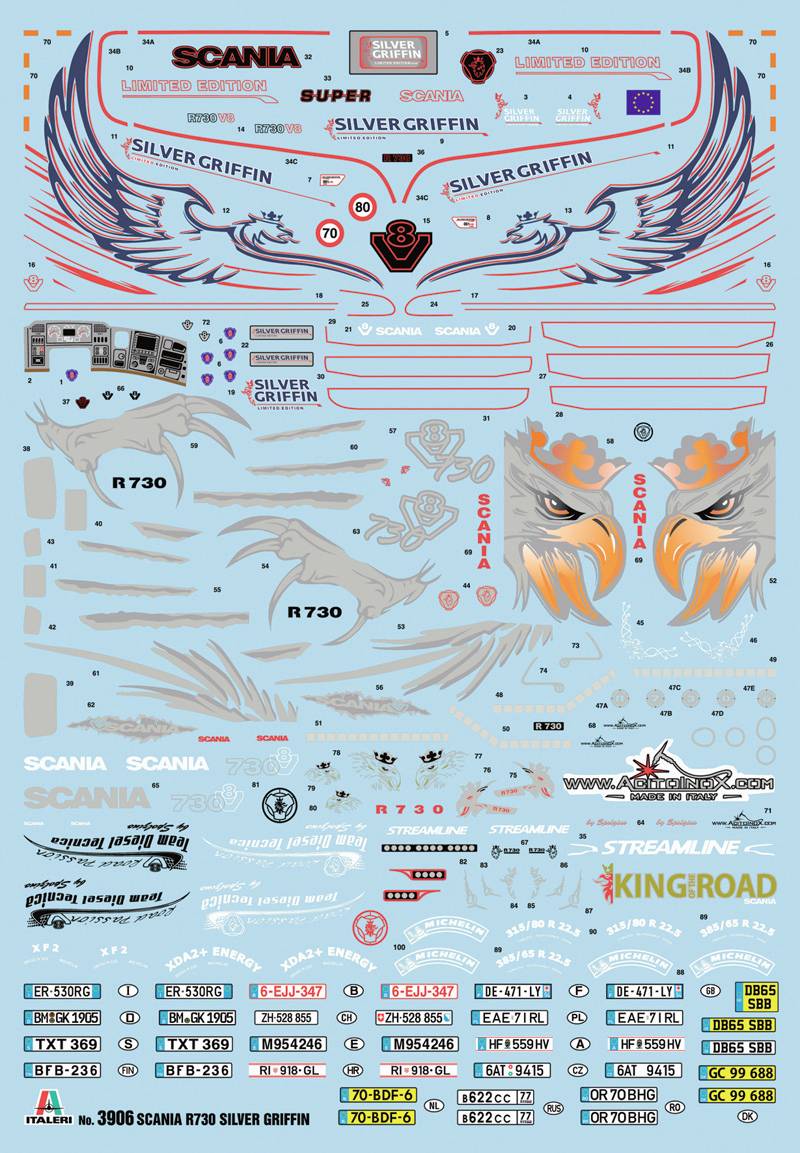 Arkusz naklejek do modelu pojazdu z różnymi elementami dekoracyjnymi: skrzydłami, głowami orła oraz logo 'Scania' i 'Silver Griffin'.