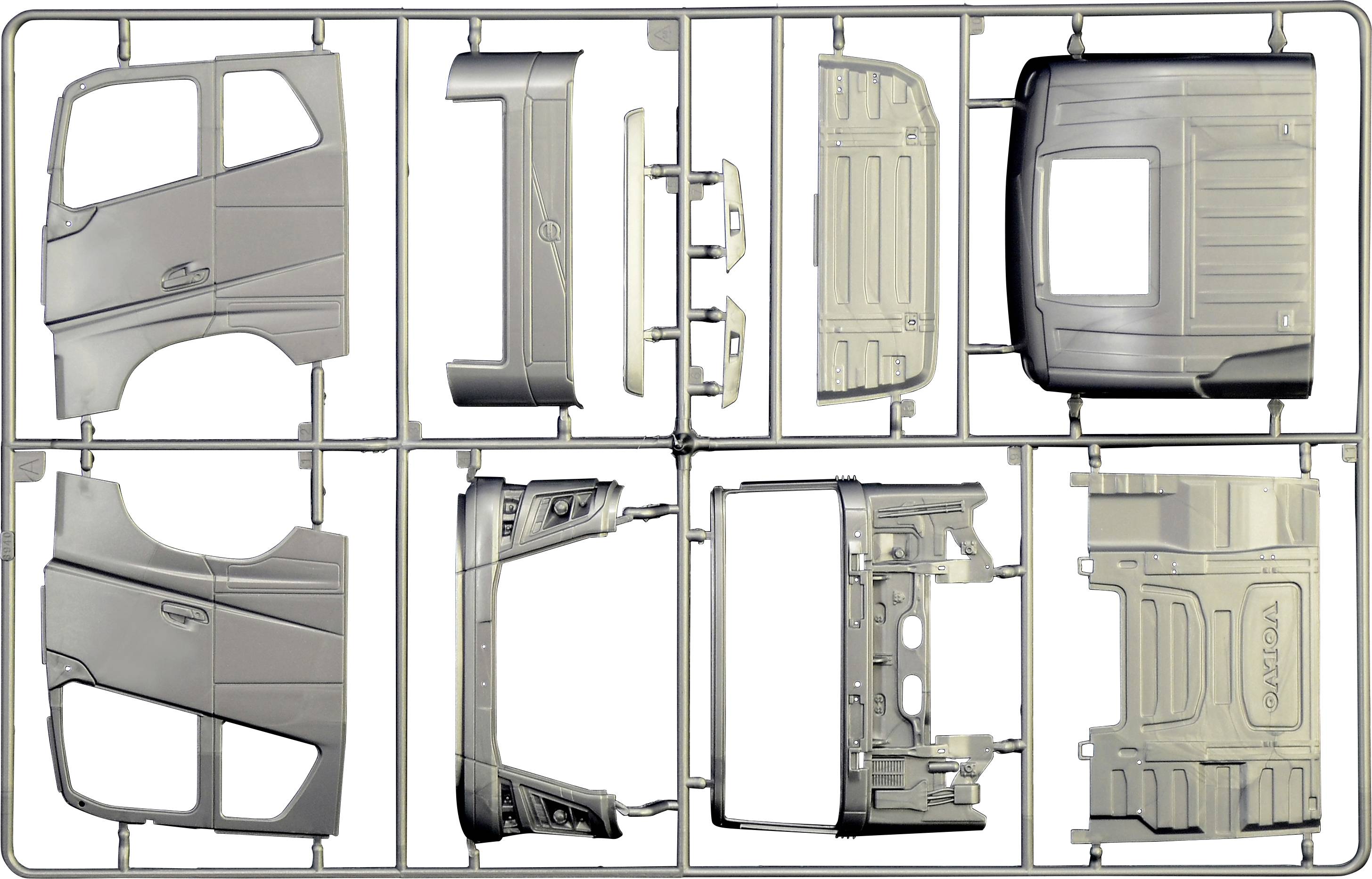 Plastikowy model ramy z częściami pojazdu; elementy kabiny i nadwozia modelu ciężarówki. Części są niepokryte i złożone.