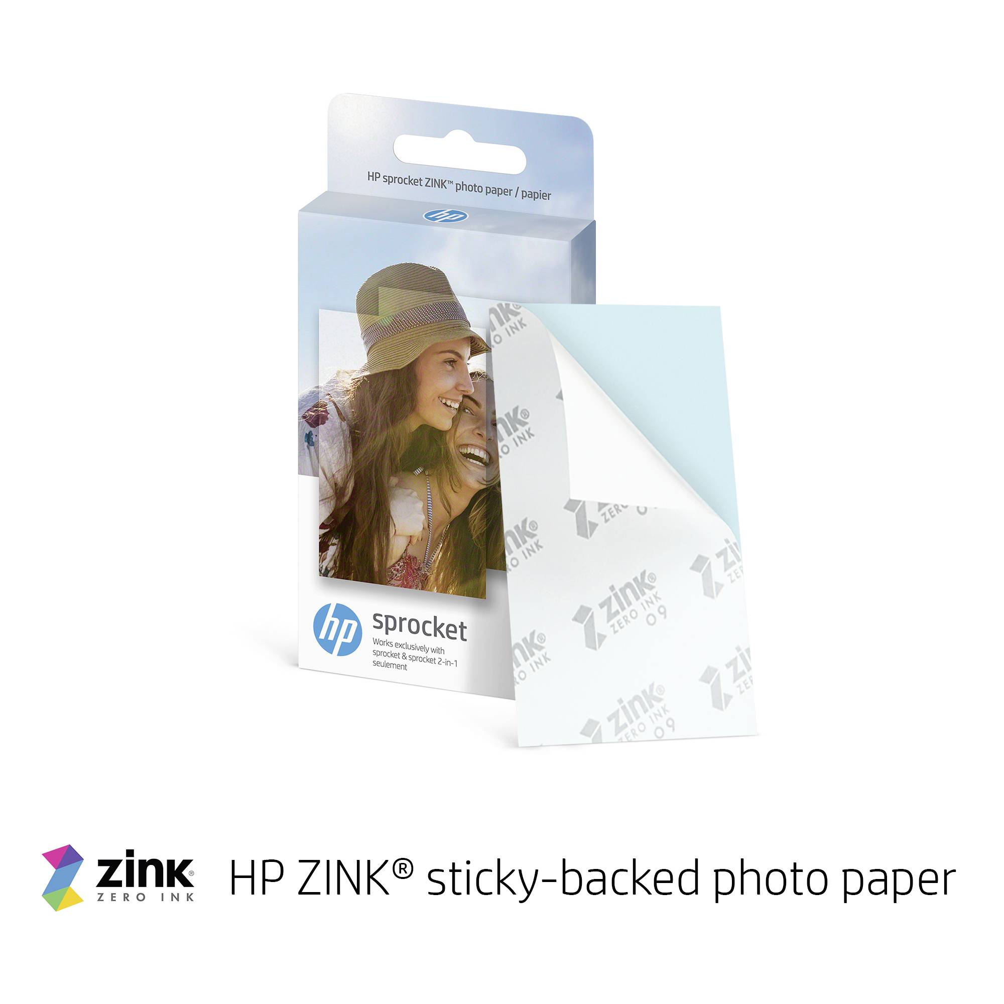 Opakowanie papieru fotograficznego HP ZINK® z samoprzylepnym tyłem, zawierające zdjęcie przedstawiające dwie uśmiechnięte osoby. Opakowanie opatrzone logo ZINK ZERO INK®.