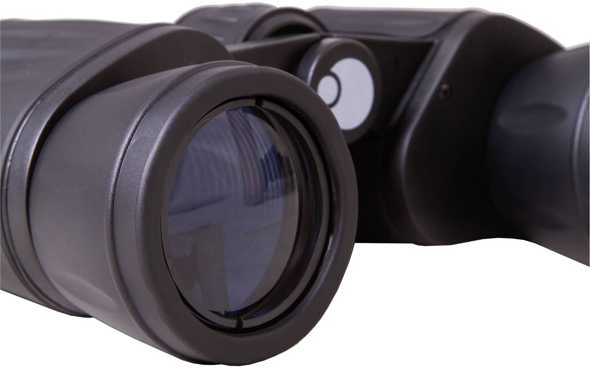 Lornetka leży na powierzchni, przedstawiając soczewki w zbliżeniu. Idealna do obserwacji odległych obiektów.