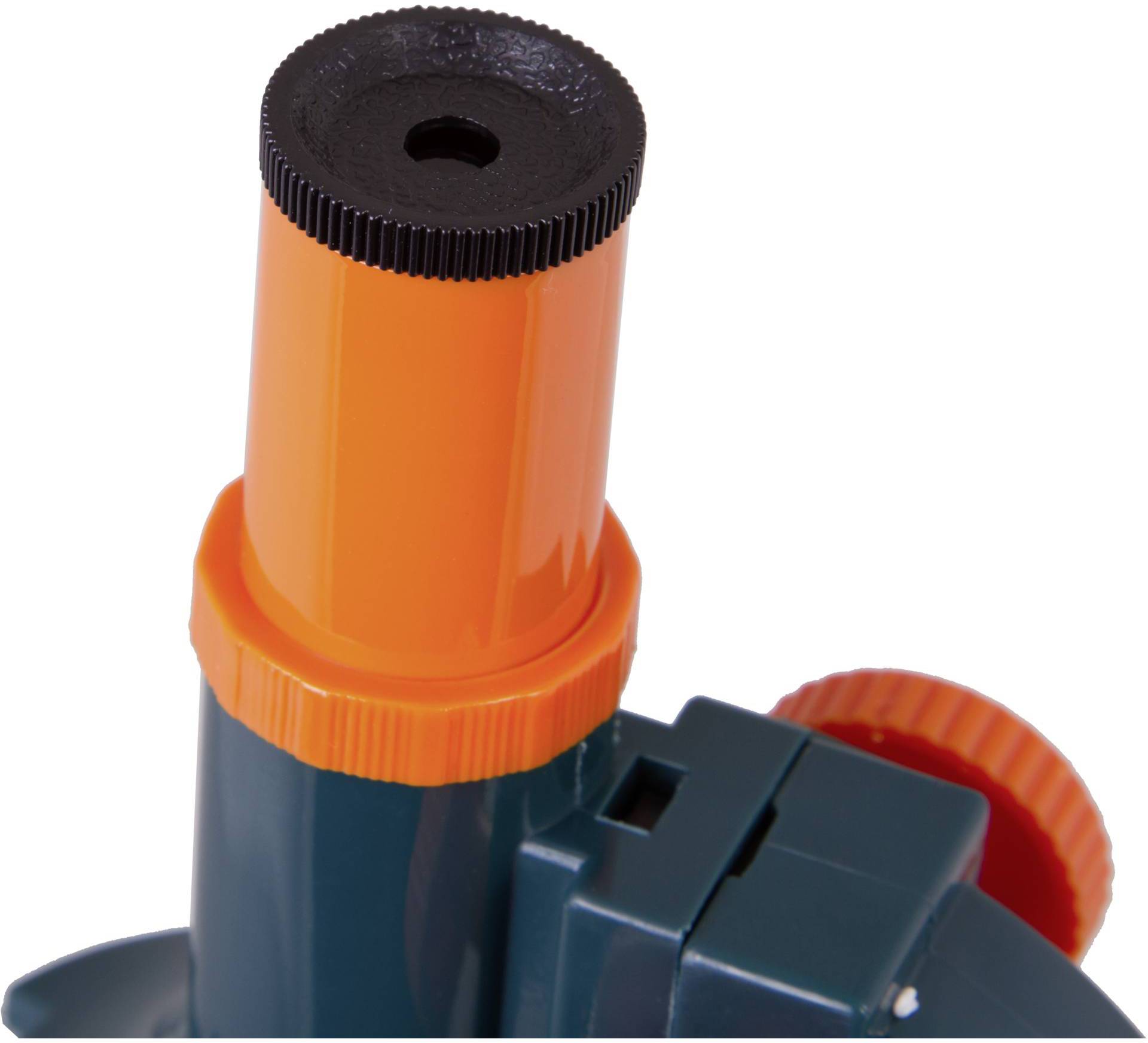 Pomarańczowo-czarna plastikowa część z kołem zębatym, prawdopodobnie element jakiegoś urządzenia mechanicznego lub technicznego.