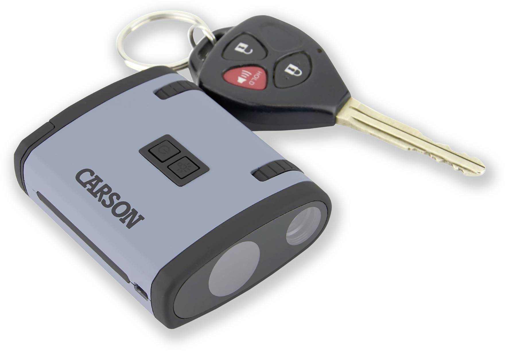 Brelok z kluczykami samochodowymi i małym, szarym urządzeniem z napisem 'Carson', które wygląda jak dalmierz.