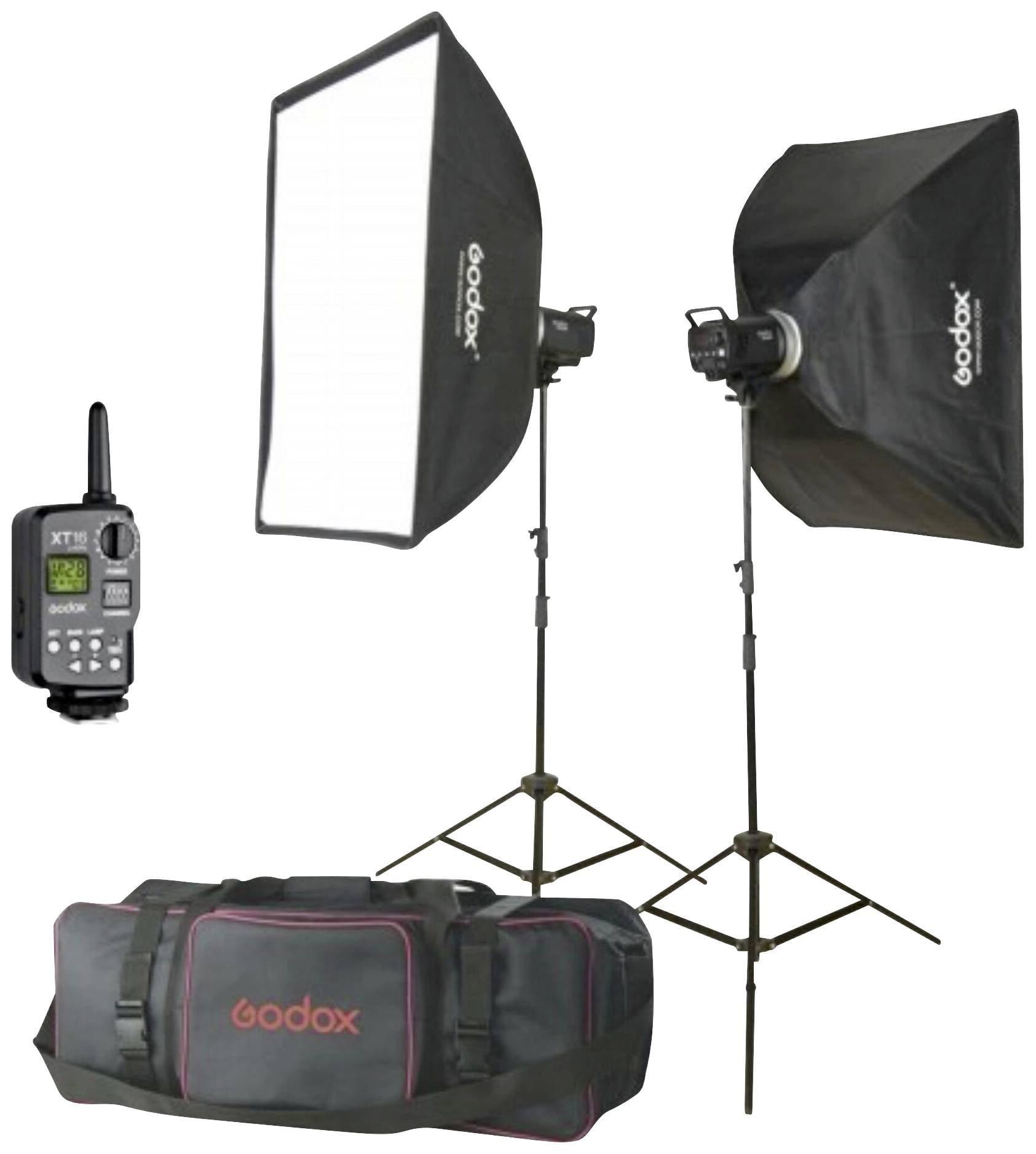 Dwa lampy studyjne z kwadratowymi softboksami na statywach, pilot zdalnego sterowania i duża torba transportowa. Idealne do fotografii.