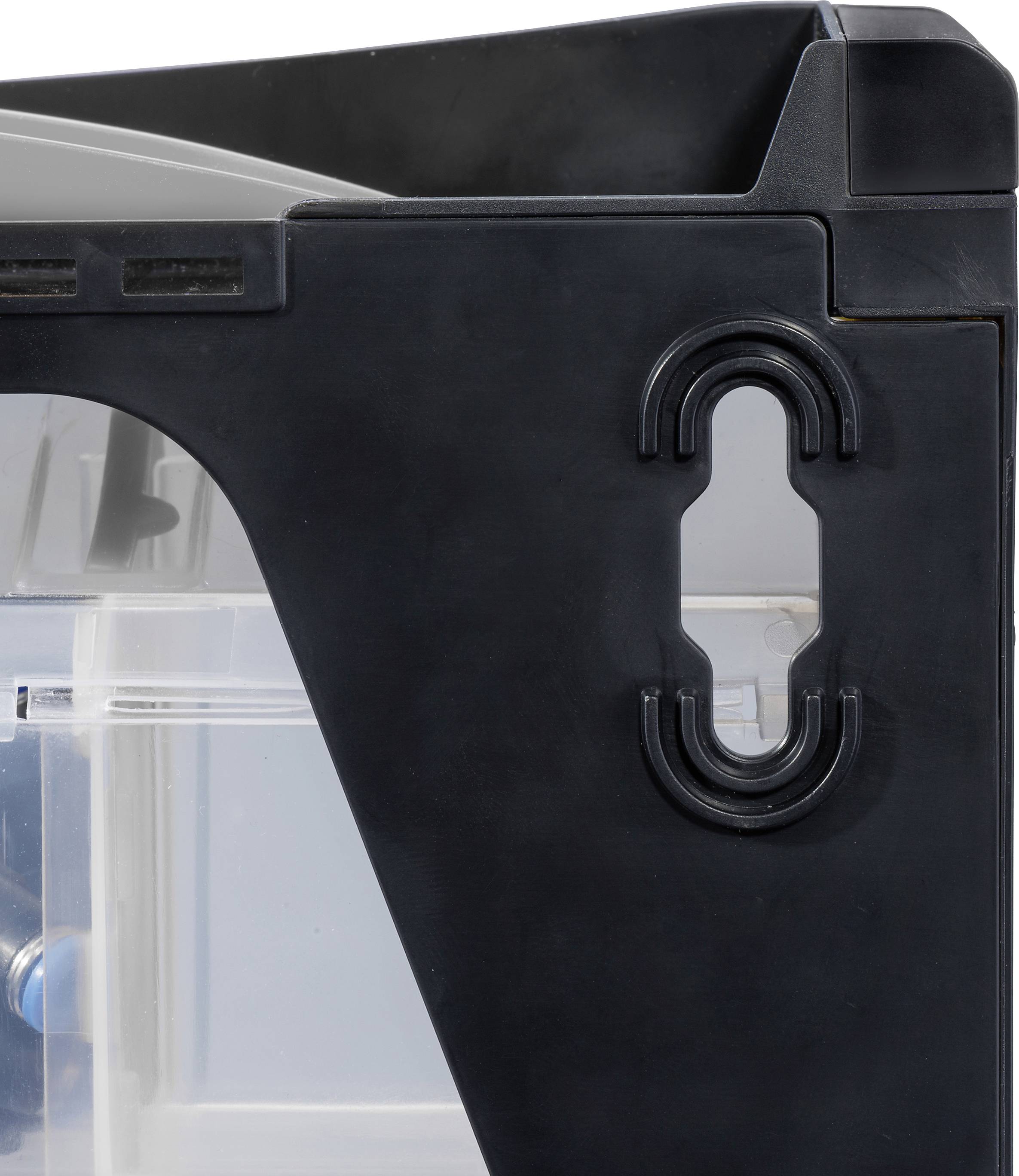 Fragment czarnej obudowy z tworzywa sztucznego z bocznym okienkiem oraz owalnym uchwytem do obserwacji wnętrza.