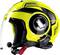 Żółty kask motocyklowy z zintegrowaną przyłbicą i czarnym wzorem. Wyposażony w jednostkę sterowania dźwiękiem z boku.