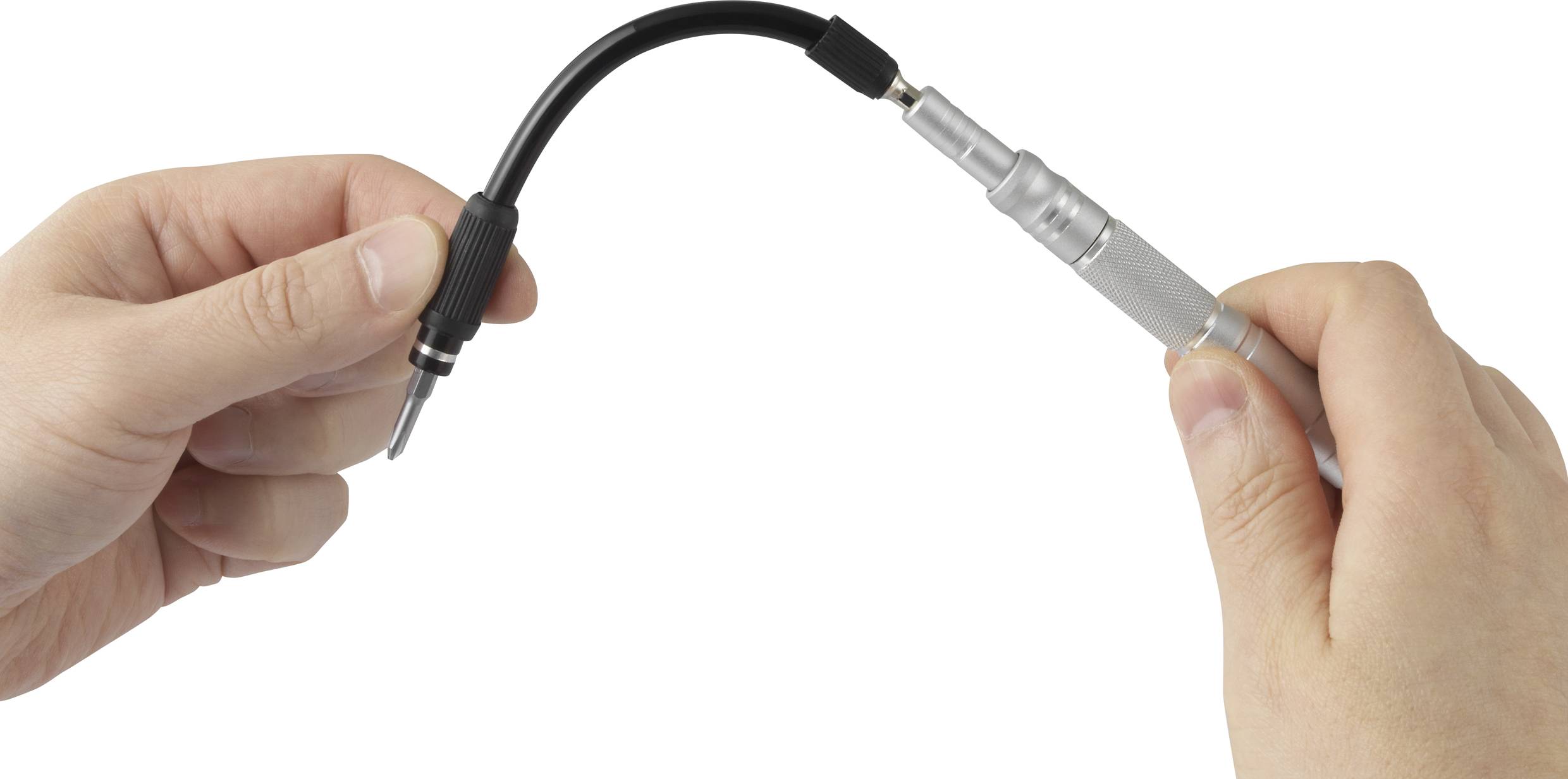 Dwie ręce trzymają elastyczny śrubokręt. Lewa ręka chwyta za głowicę, prawa za rękojeść. Trzon jest wygięty.