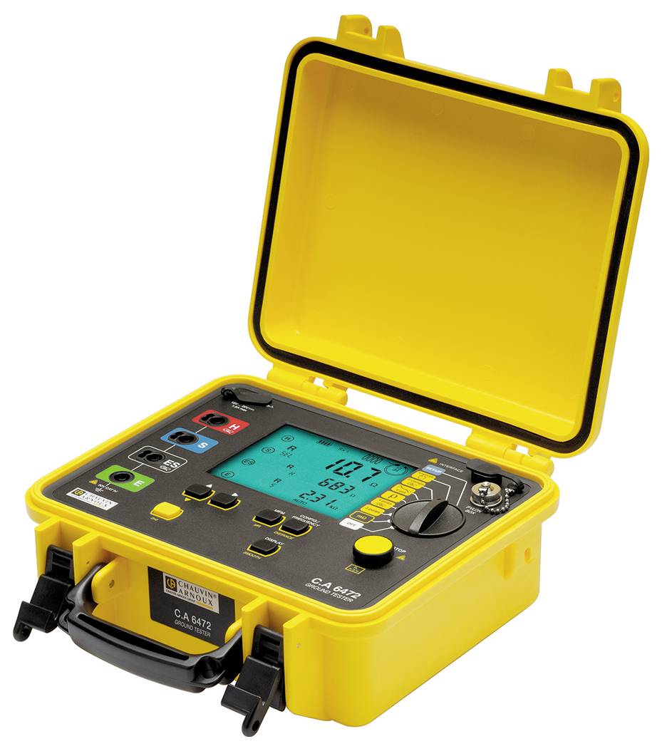 Żółte przenośne urządzenie pomiarowe z wyświetlaczem i kilkoma przyciskami, pokazujące wartość pomiarową 10,7 oraz wartości procentowe. Obudowa z uchwytem do przenoszenia.