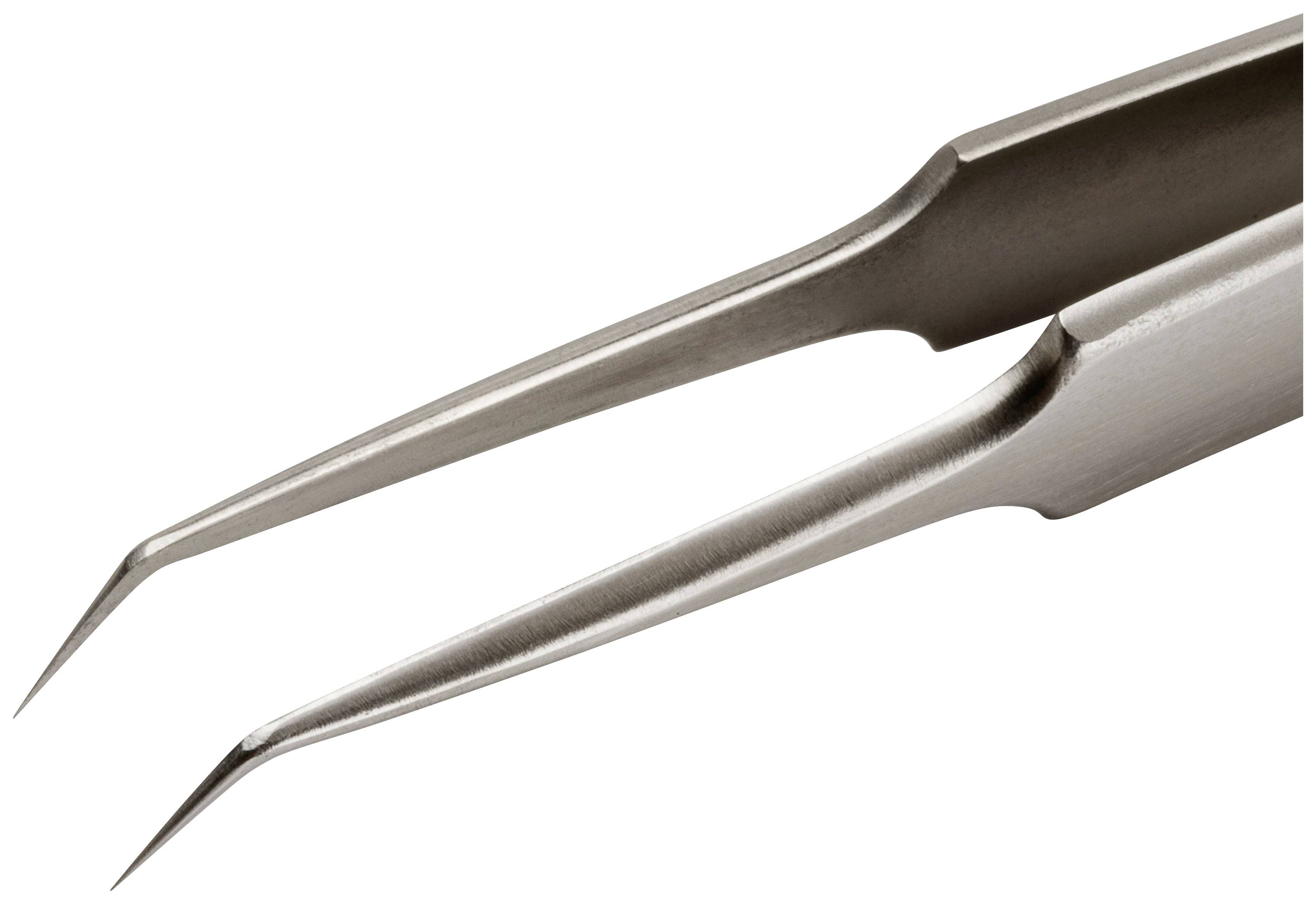 Zbliżenie dwóch metalowych pincet o spiczastych końcówkach, używanych do precyzyjnych prac takich jak wytwarzanie biżuterii lub elektronika.