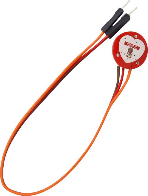 Okrągły elektroniczny termometr z czerwonymi przewodami i wtyczką, przeznaczony do pomiaru temperatury w zastosowaniach technicznych.