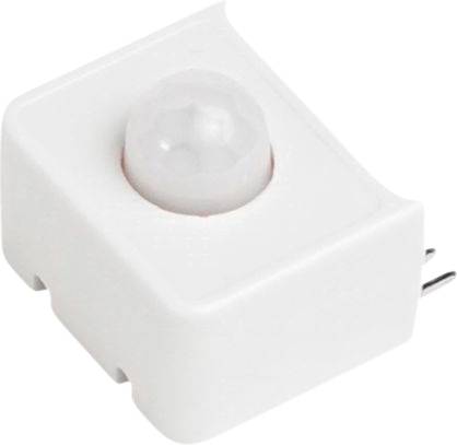 Biały, kwadratowy czujnik z kulistym wypukłym elementem pośrodku. Po prawej stronie widoczne są metalowe styki do podłączenia.