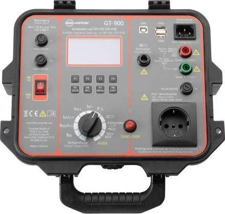 Czarne urządzenie GT-900 z wieloma przyciskami, przełącznikami i złączami do badań elektrycznych. Wyświetlacz wskazuje '30 V wyświetlanie'.