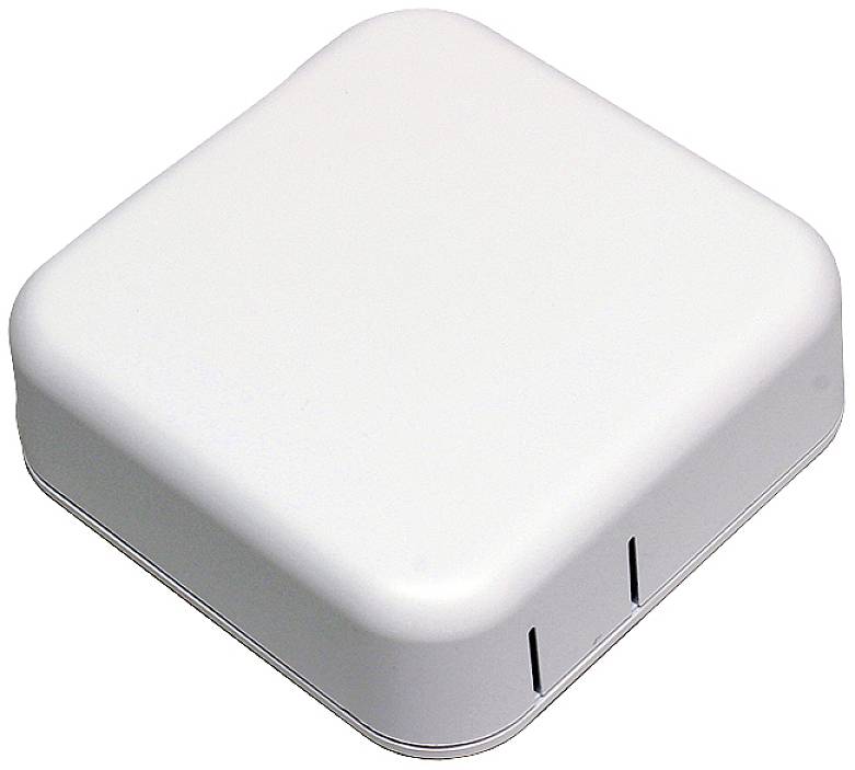 Biała, kwadratowa kotka o zaokrąglonych rogach i szczelinach po bokach, prawdopodobnie urządzenie techniczne, takie jak router lub czujnik.