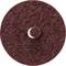 Okrągły, ciemnobrązowy pad ścierny o szorstкiej, filcowatej strukturze z otworem centralnym.