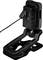 Przenośne urządzenie w uchwycie z podłączonym kablem i wskaźnikiem LED, który pokazuje stan naładowania.