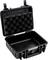 Czarny, pusty, twardy, otwarty kufer ochronny z wyściółką piankową wewnątrz, odpowiedni do bezpiecznego transportu delikatnych urządzeń.