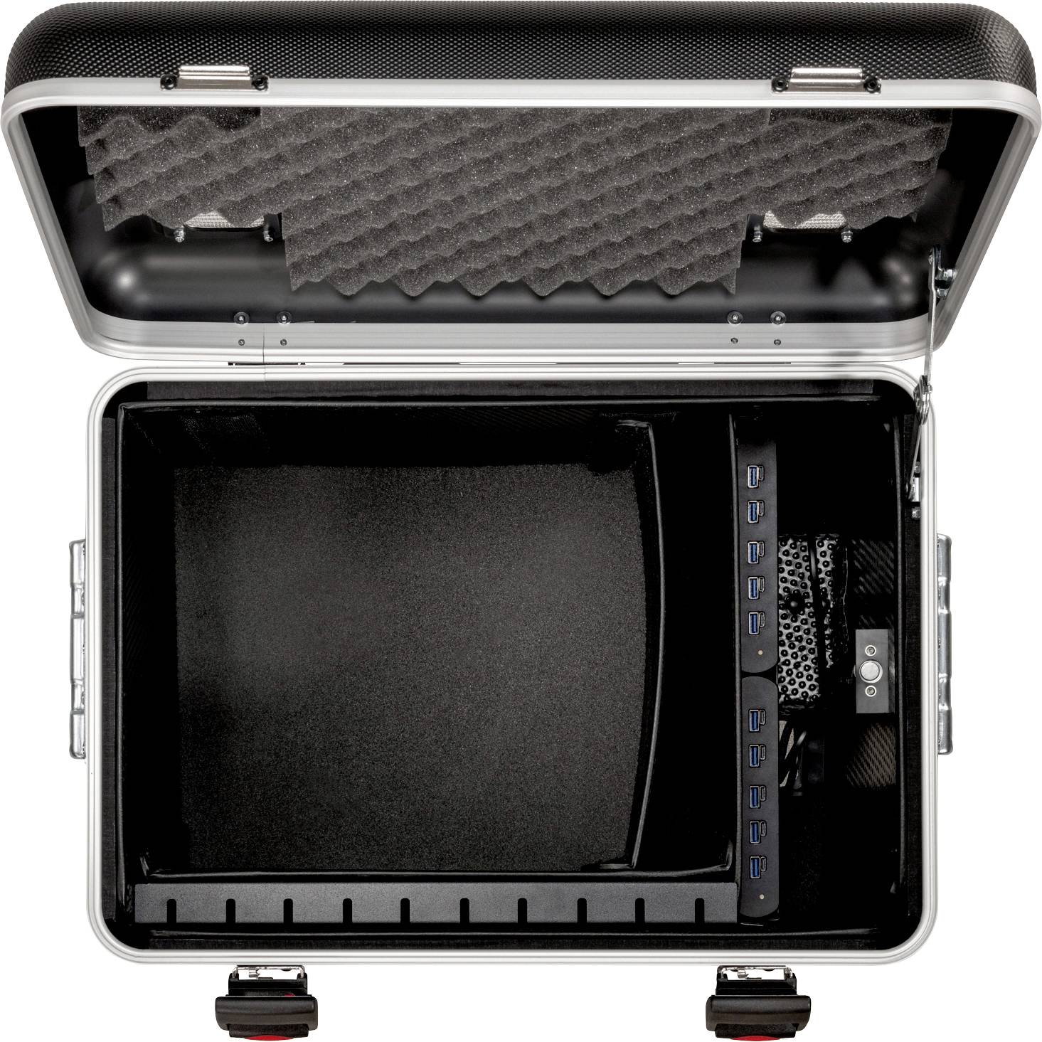 Otwarty, pusty twardy kufer z gąbką w pokrywie do przechowywania urządzeń elektronicznych, widoczne gniazda po prawej stronie.