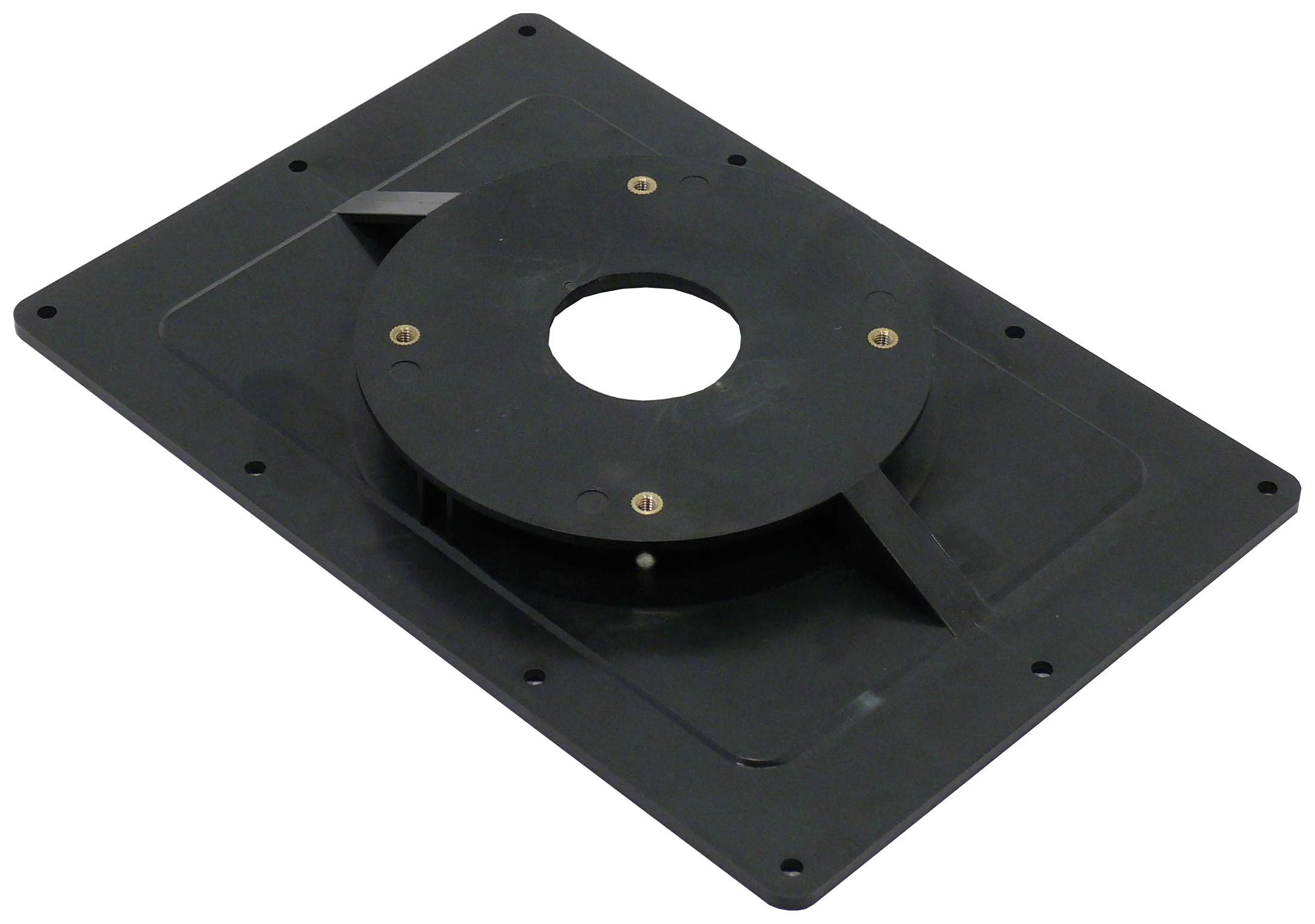 Prostokątna czarna płyta z tworzywa sztucznego z okrągłym otworem i otworami na śruby, prawdopodobnie element jakiegoś urządzenia technicznego.