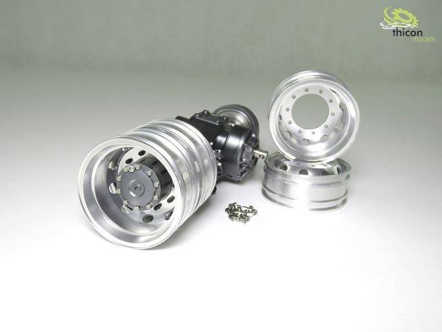 Cztery błyszczące metalowe felgi, jedna zamontowana na napędzie, z małymi śrubami przed nią. W tle logo 'thicon'.