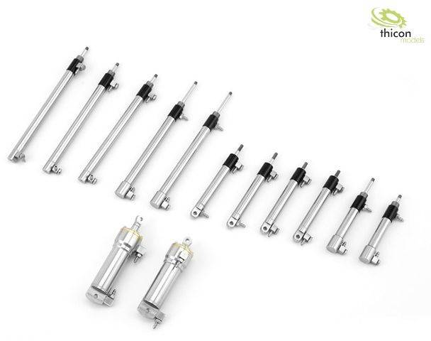 Różne cylindry hydrauliczne o różnych rozmiarach, ułożone od lewej do prawej strony na białym tle.