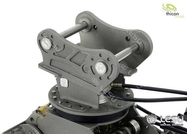 Konstrukcja metalowa z dwoma pionowymi dźwigniami i przewodem, umieszczona na maszynie; logotypy 'Thicon Models' i 'LESU'.