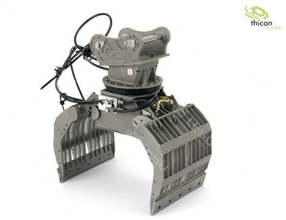 Przemysłowe ramię chwytające z metalowymi łopatkami, nadające się do modelarstwa lub projektów maszynowych, na białym tle.