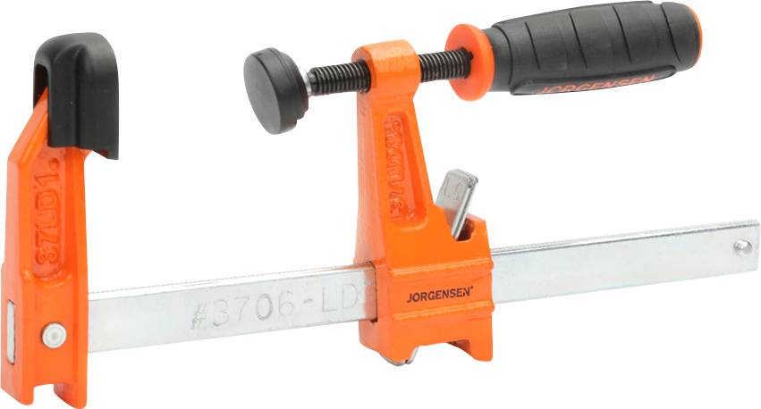 Pomarańczowy imadło ze stalową szyna i czarną rękojeścią, przeznaczone do mocowania i unieruchamiania elementów roboczych.