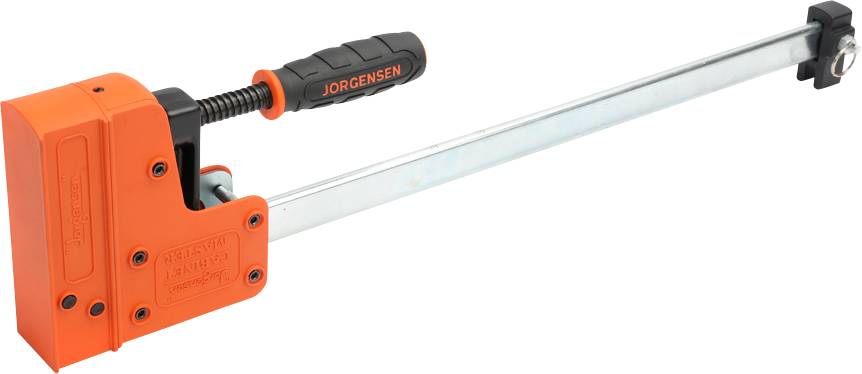 Pomarańczowa metalowa ściska z czarną rączką, oznaczona napisem 'Jorgensen', używana do ściskania materiałów podczas klejenia lub obróbki.