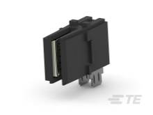 Czarny elektroniczny złącz z wieloma stykami, przedstawiony na neutralnym tle, prezentuje szczegóły techniczne.