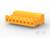 Żółty, prostokątny element z tworzywa sztucznego posiadający kilka gniazd, prawdopodobnie będący częścią systemu elektronicznego lub mechanicznego.