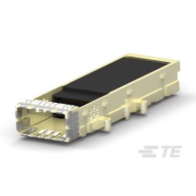 Żółty moduł elektroniczny z metalowymi stykami po jednej stronie leży na białej powierzchni. Wygląda na urządzenie techniczne.