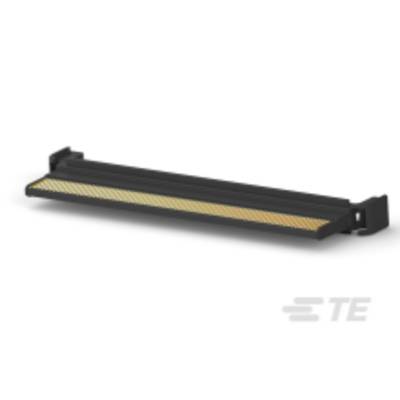 Czarny, podłużny element techniczny o żółtawej powierzchni, prawdopodobnie radiator lub element łączący, na szarym tle.
