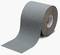 Rolka szarego papieru ściernego z napisem '3M Safety-Walk' na boku, na białym tle.
