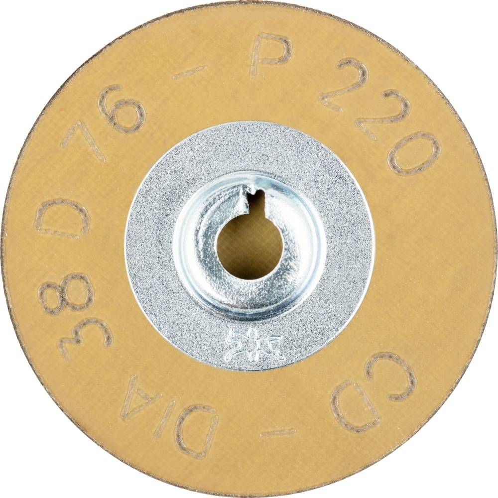 Tarcza ścierna z napisem '76 - P 220 - D 76 - DA 35' na powierzchni. Głównie pomarańczowa z metalem pośrodku.