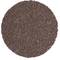 Zbliżenie okrągłej, brązowej tarczy szlifierskiej o chropowatej, ziarnistej powierzchni. Używana jest do obróbki metalu lub drewna.