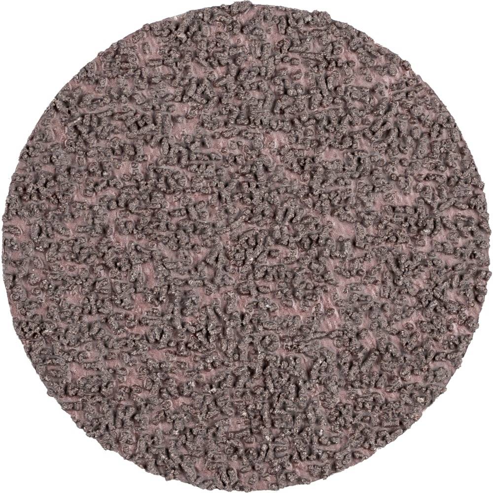 Okrągła tekstura o szorstkim, nierównym powierzchni w różnych odcieniach brązu i różu.